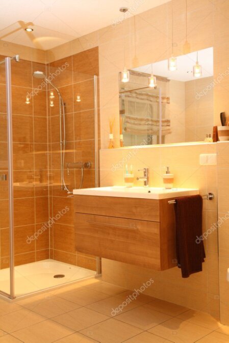 リフォーム後の明るく清潔なキッチンと浴室のイメージ写真