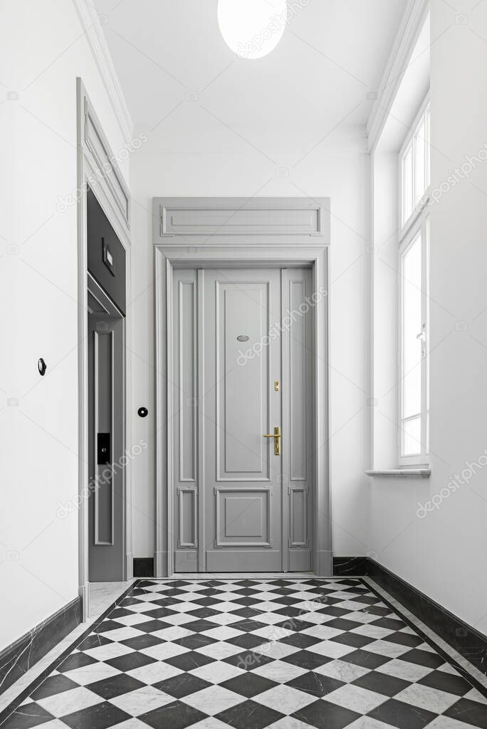 マンション共用部床洗浄・ワックス掛け後の光沢ある床の様子